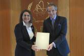 HE Ms. Natasha Meli Daudey, Resident Representative of the Republic of Malta to the IAEA, presents Malta’s contribution for the Marie Sklodowska-Curie Fellowship Programme (MSCFP) to Rafael Mariano Grossi, IAEA Director General, during her official visit at the Agency headquarters in Vienna, Austria. 2 November 2022. 