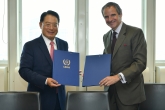 Rafael Mariano Grossi, IAEA Director General and LI Yong, UNIDO Director General, signs the Practical Arrangements between the International Atomic Energy Agency and the United Nations Industrial Development Organization on Cooperation in the area of Peaceful Uses of Nuclear Technology for Inclusive and Sustainable Industrial Development at the Agency headquarters in Vienna, Austria. 12 June 2020
