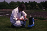 Scientist demonstrating the Neutron Moisture Probe to measure soil-water balance at the IAEA laboratory in Seibersdorf near Vienna. May 1999. Please credit IAEA/GAGGL Klaus
