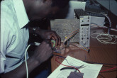 Training to enhance repair and maintenance procedures and thereby improve the infrastructure on which research programmes depended, as the frequent breakdown of electronic equipment in developing countries due to an erratic electric supply was a hindrance to the use of advanced techniques and could be very damaging to microprocessor-based equipment. 1984-1986. Please credit IAEA/DAGLISH James
