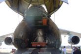 The truck and the over-package in "flight position" just before the closing of the plane. Final destination: Mayak reprocessing facility, Russia. (Photo: S. Tozser/IAEA)