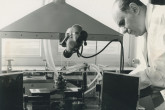 Julian Czakow, IAEA staff member, adjusting the electrode distance of a Polish distillation furnace for spectrographic samples. April 1964. Please credit IAEA