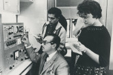 Prof. Armando López Martin del Campo (seated), Director of the Department of Research at the University of Guanajuato, lecturing students on the use of a geiger counter installed in the mobile laboratory. 18 February 1960. Please credit UN Photo/Yutaka Nagata