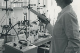 IAEA staff member Helga Axmann analysing for trace elements in plant material by a distillation method in the laboratory in Seibersdorf, near Vienna.  April 1964. Please credit IAEA  