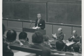 John B. Adams, Director of Culham Laboratory, speaking at the opening of the conference; (right) Sir John Cockcroft, Master of Churchill College, and Henry Seligman, IAEA Deputy Director General. 
(IAEA Archives/Credit: UKAEA, United Kingdom)