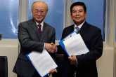 Signing between H.E.  Mr. Suy Sem, Cambodian Minister of Industry, Mines and Energy, and IAEA Director General Yukiya Amano of the Revised Supplementary Agreement concerning the provision of Technical Assistance by the IAEA to the Government of the Kingdom of Cambodia, IAEA, Vienna, Austria, 25 November 2011.