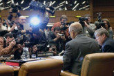 Under the media glare, IAEA Director General briefs the international press. (Photo Credit: D. Calma/IAEA)