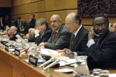Inside the Board room, IAEA Director General ElBaradei (center) is flanked by Mr. Olli Heinonen, Deputy Director General for Safeguards (left), and Japan Ambassador Yukiya Amano, Chairman of the IAEA Board. (Photo Credit: D. Calma/IAEA)