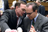 US Ambassador Gregory Shulte (left) consults with a colleague during today&acute;s Board session. (Photo Credit: D. Calma/IAEA)