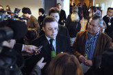 The Russian Ambassador answers questions from the gathered media representatives at the close of the special IAEA Board meeting. (Photo Credit: D. Calma/IAEA)
