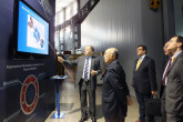 IAEA Director General Yukiya Amano is given a presentation during their arrival to the Joint Institute for Nuclear Research, Dubna, Moscow Region, during his official visit to Moscow. 18 May 2013