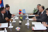 Mr. Sodnom Enkhbat, Director General of the Mongolian Nuclear Energy Agency, briefed Mongolia's ambassador and Resident Representative to the IAEA, Mr. Jargalsaikhany Enkhsaikhan (left), Director General Amano (middle) and Mr. Rafael Grossi Chief of Cabinet (right), on Mongolia's energy planning.