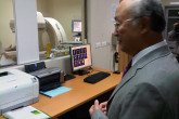IAEA Director General Yukiya Amano at Cancer Treatment Center in Viet Nam. 4 October 2011