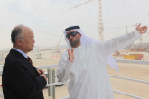 IAEA Director General Yukiya Amano at Barakah nuclear power plant construction site, United Arab Emirates Mr. Mohamad Al Hammadi (right), Chief Executive Officer of the Emirates Nuclear Energy Corporation (ENEC) and IAEA Director General Yukiya Amano view construction at the Barakah nuclear power plant construction site during the Director General's official visit to United Arab Emirates. 29 January 2013. Photo Credit: ENEC