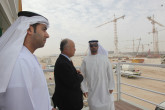 IAEA Director General Yukiya Amano at Barakah nuclear power plant construction site, United Arab Emirates Mr. Mohamad Al Hammadi (right), Chief Executive Officer of the Emirates Nuclear Energy Corporation (ENEC), Ambassador Hamad Al Kaabi (left), Resident  Representative of UAE to the IAEA, and IAEA Director General Yukiya Amano (middle) view construction under way at the Barakah nuclear power plant construction. 29 January 2013. Photo Credit: ENEC