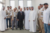 IAEA Director General Yukiya Amano with staff from the Emirates Nuclear Energy Corporation (ENEC) during the Director General's official visit to the Barakah nuclear power plant construction, United Arab Emirates. 29 January 2013. Photo Credit: ENEC