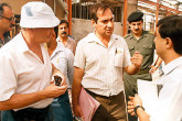 IAEA Inspector negotiates with Iraqi authorities to gain entryinto a production workshop in Badar. Photo Credits: Action Team 1991-1998/IAEA