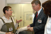 Director of the IAEA Seibersdorf Laboratories, Ms. Gabriele Voigt and Mr. David Donohue, head of the Clean Laboratory Unit Photo Credits: D. Calma/IAEA 19 December 2002