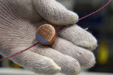 Metallic seals are used to prevent unauthorised access to safeguarded materials. The inside of each seal has its own unique markings (like a fingerprint). Before a seal is used in the field, these markings are recorded. If the seal is tampered with, these markings will change. When returned to the IAEA, the seal is carefully analysed to ensure that it is the tamper-free original.