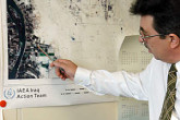 Images from commercial satellite and digital monitoring systems are analyzed as part of IAEA inspector operations in Iraq. Photo Credits: Dean Calma/IAEA Nov 2002