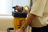An Action Team inspector demonstrates "Alex's" capabilities. September 2002

Photo Credits: Dean Calma/IAEA 