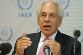 Mr. A. Baer, President of the Conference answering questions from the media at the Press Conference. (Credit: D. Calma/IAEA)