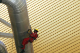 A demonstrated high safety standard in nuclear facilities is essential to sustain the future growth of nuclear power technology. Here a worker conducts regular maintenance check-up of plant components. (Photo Credit: Angra Brazil)