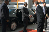 UN Secretary-General Kofi Annan is greeted by the Director General of the UN Office in Vienna, Mr Antonio Maria Costa.