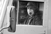 Truck drivers wear face masks throughout the journey and while delivering their loads, to avoid inhaling radioactive particles.