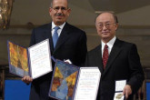 Holding the Nobel Medals for Peace.  The 2005 prize is jointly shared by the IAEA and its Director General Mohamed ElBaradei.