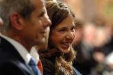 Laila ElBaradei looks on with tears of joy as her father speaks of peace.