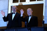 The laureates wave to the crowd.