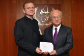 The new Resident Representative of the Holy See, Rev. Msgr Janusz Stanisław Urbańczyk, presents his credentials to IAEA Director General Yukiya Amano in Vienna, Austria on 11 March  2015.