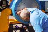 A final check of the IAEA’s seals. (Photo: S. Tozser/IAEA)