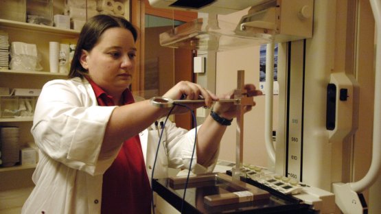 The ionisation chamber of a mammography X ray machine at Vienna's AKH is adjusted for dose measurement, 2006. (Photo: D.Calma/IAEA)