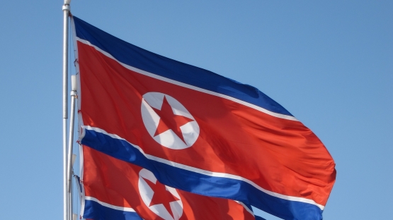 DPRK flag - photo credit Flickr photo by J. Pavelka/(cc by 2.0)