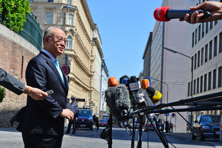 IAEA Director General Yukiya Amano addresses journalists before a meeting at the Coburg Palace in Vienna, where the P5+1 - Iran talks are taking place. 