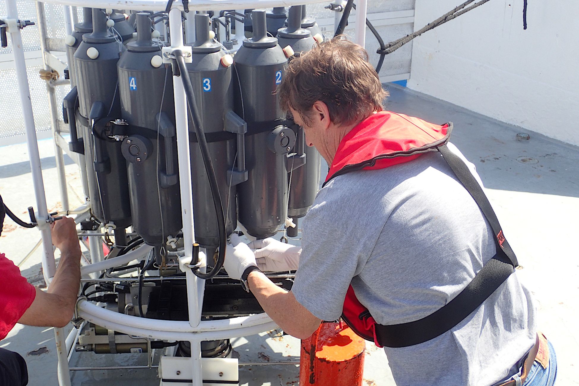 water_sampling_from_niskin_bottles_on_board_no_tethys_ii_roberta_hansman.jpg